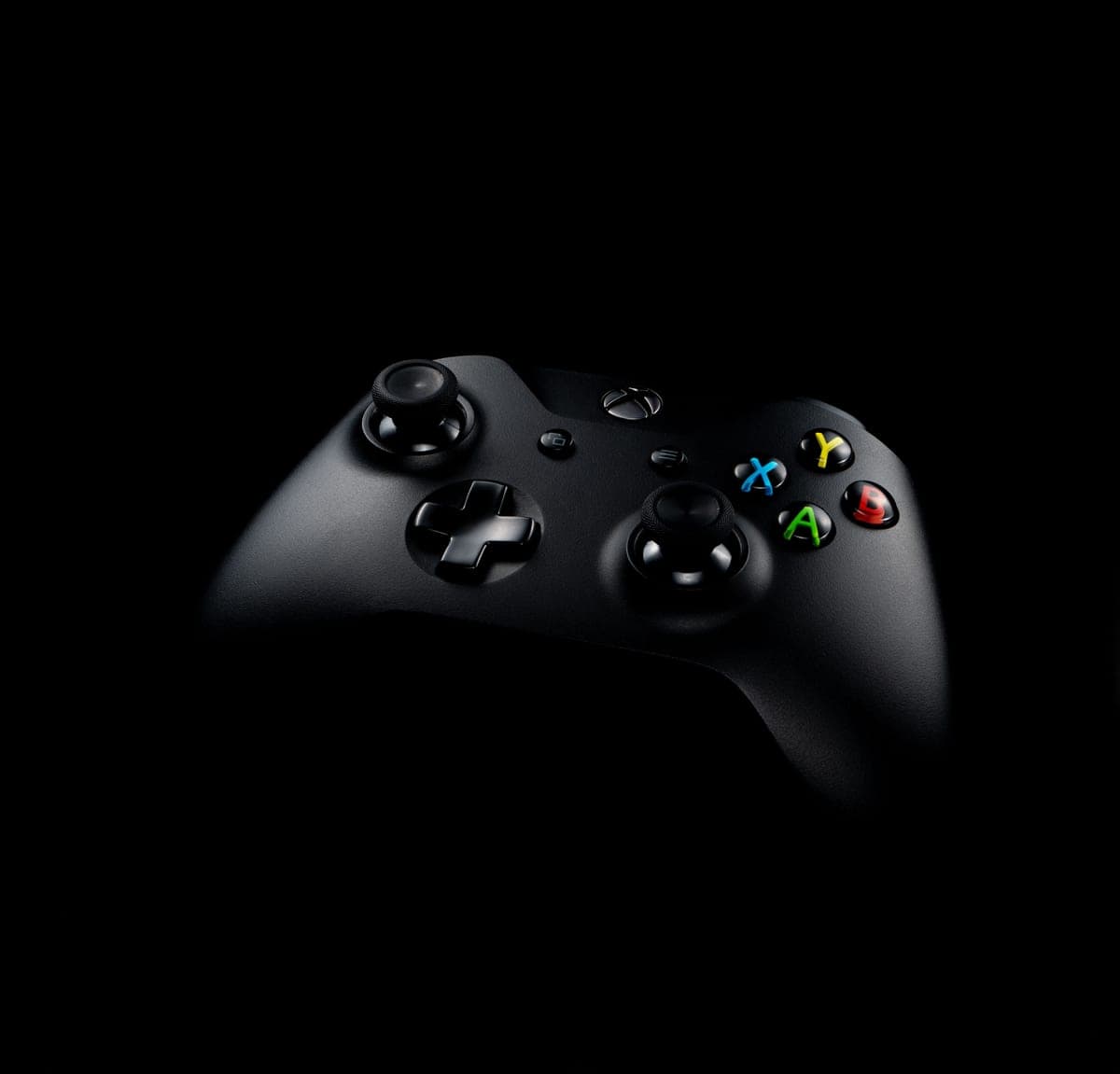 An Xbox controller on a desk — cheap Xbox game deals and Game Pass