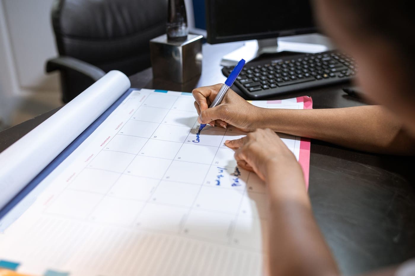 A calendar marked with game sale dates — deal-cycle guides